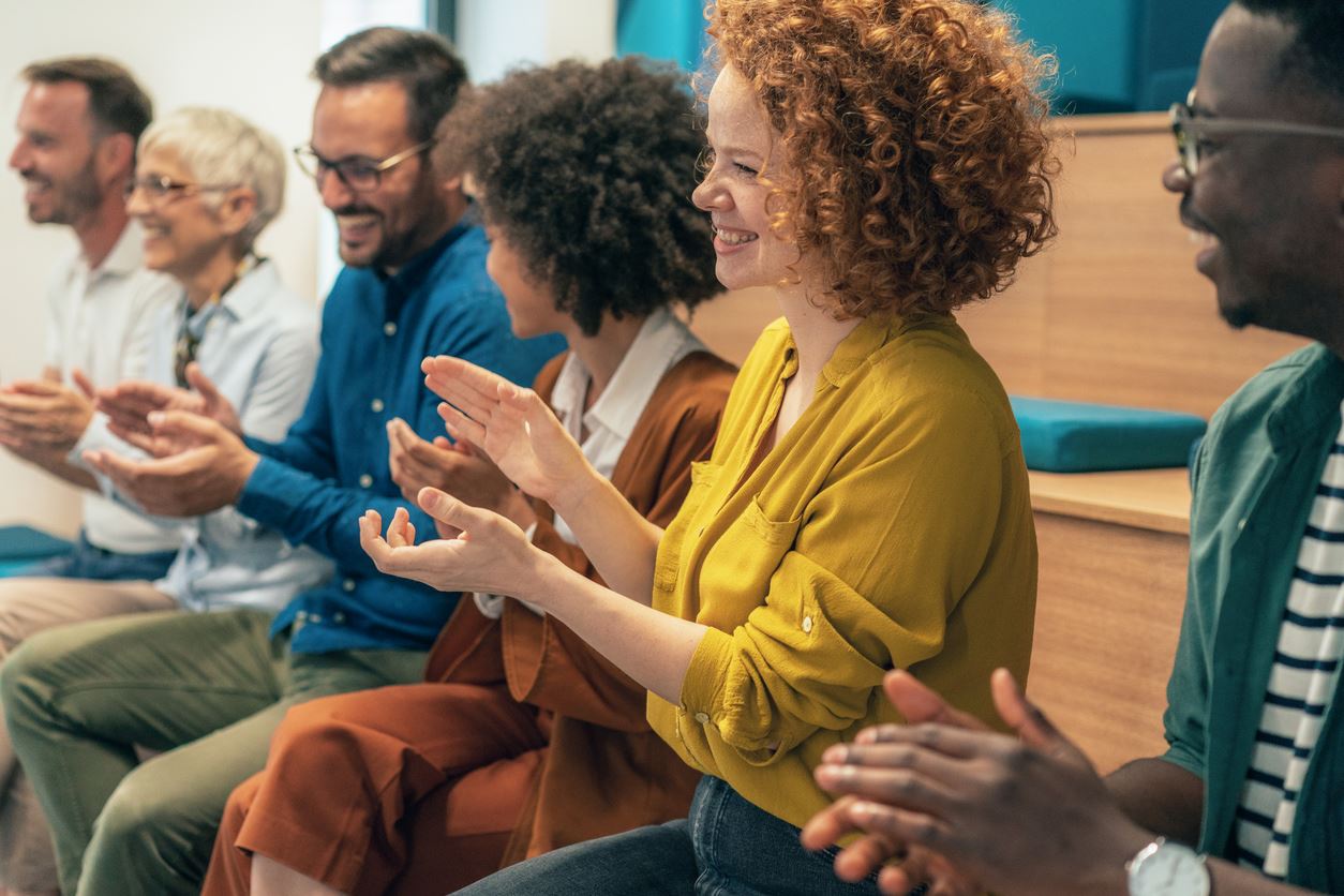 group of people cheering